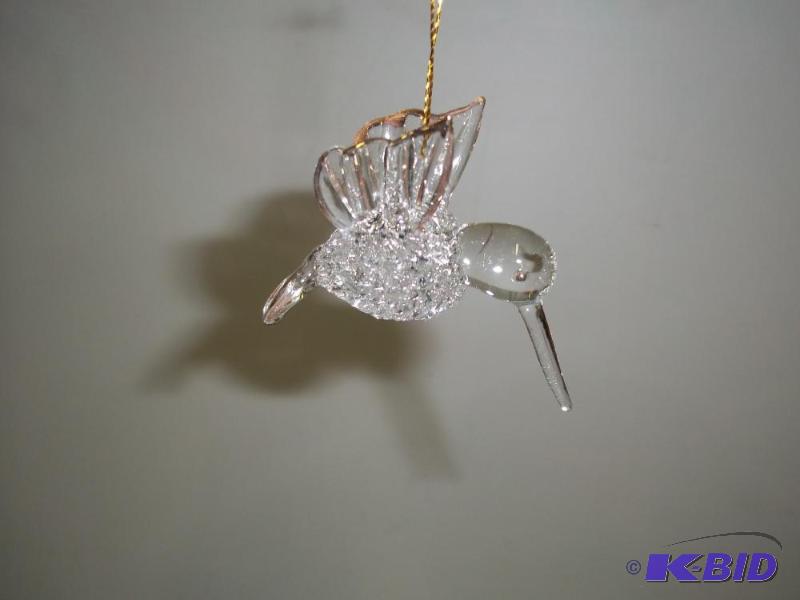 lot 102 image: Hanging humming bird...