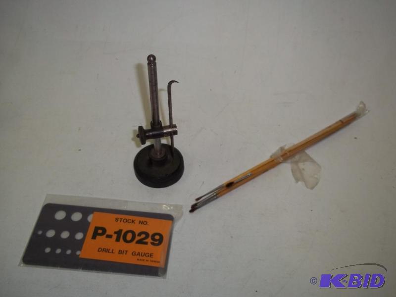 lot 37 image: Measuring tools and paintbrushes...