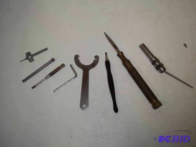 lot 68 image: Brass screwdriver with assorted precision too...