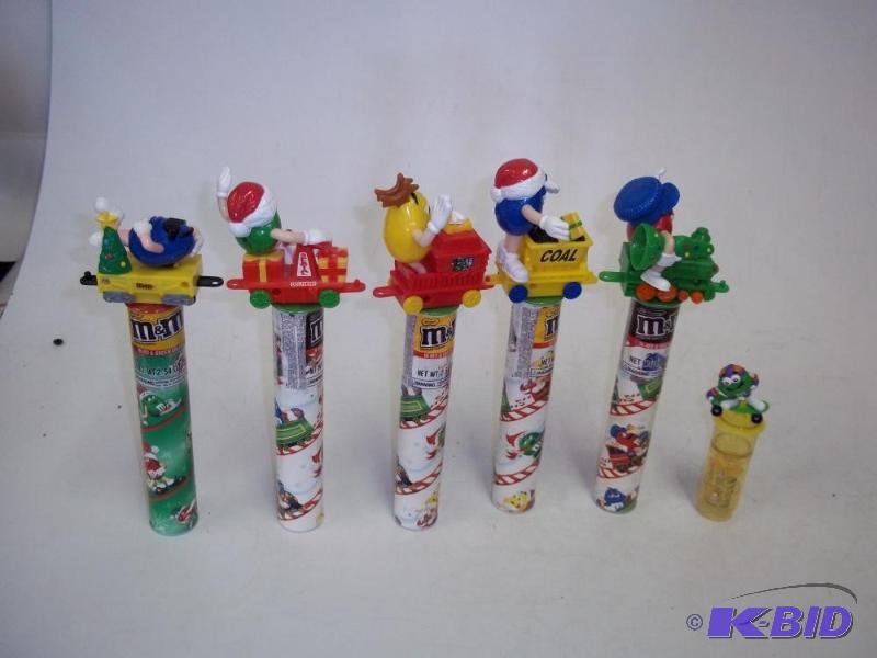 lot 76 image: M & Ms train set with canisters...