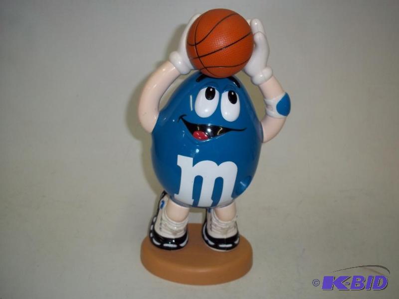 lot 83 image: M & Ms Basketball dispensor...