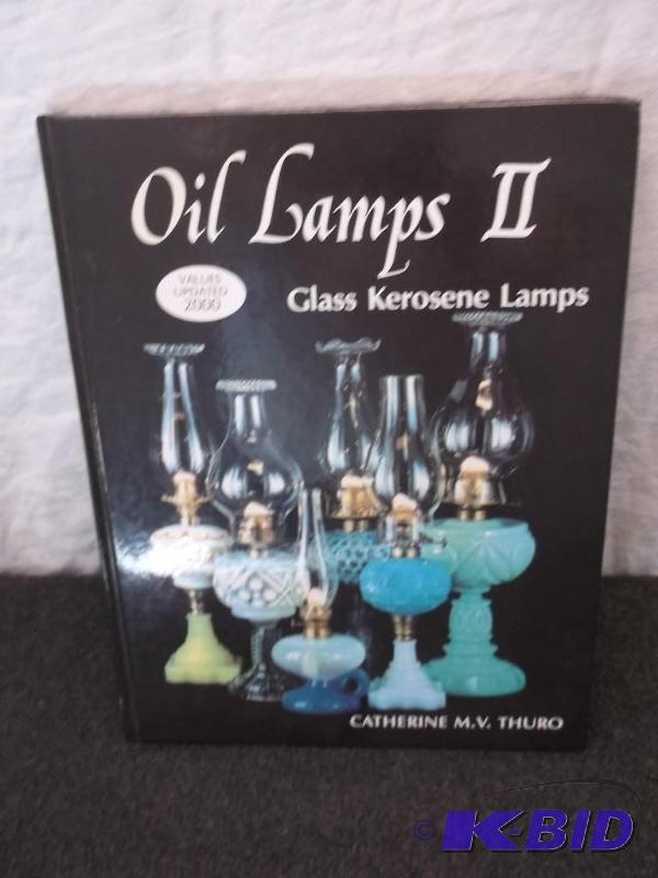 lot 125 image: Collectable Oil Lamps 2 book full of informat...