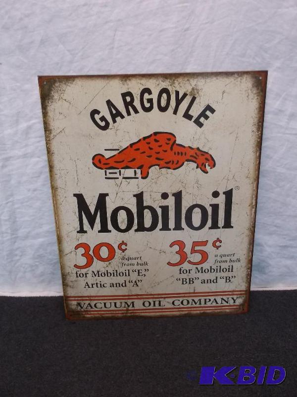 lot 16 image: Collectable metal gargoyle mobil oil sign mea...