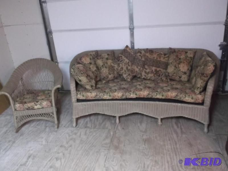 lot 44 image: Nice cushioned wicker couch & rocking cha...