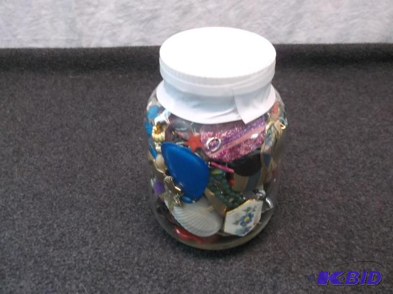 lot 88 image: Jar full of earrings, and other jewelry....