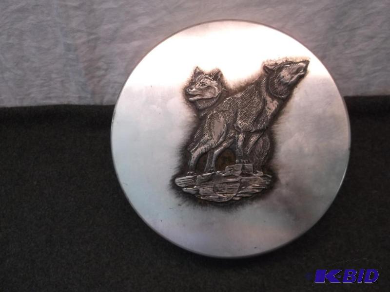 lot 93 image: Beautiful collectable tin with wolf emblem on...