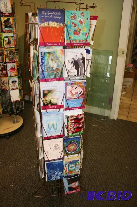 lot 211 image: Card rack and cards