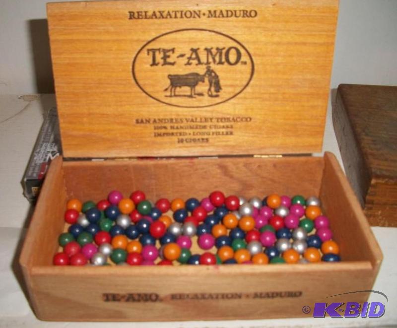 Box of mini clay marbles from early 1900