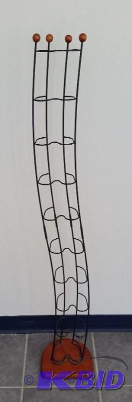 lot 15 image: Modern twisting Metal and wood CD Tower.