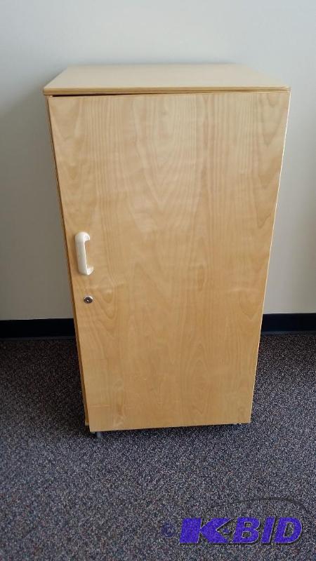 lot 24 image: Maple Laptop Charging Docking Cabinet.  Holds about 20 Ipads or Laptops.  Has 10 shelves.