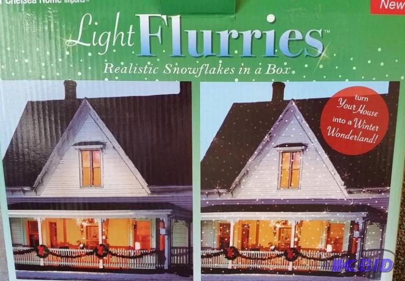 lot 31 image: Light Flurries Snowflake Projector & color Lamp.  New in Box Tested Works