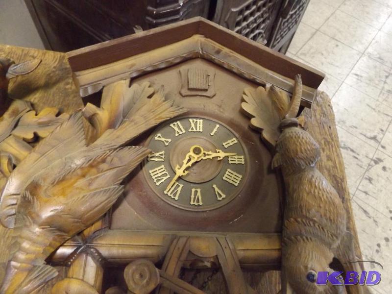 lot 560 image: Cuckoo Clock, in pieces, do not know if it wo...
