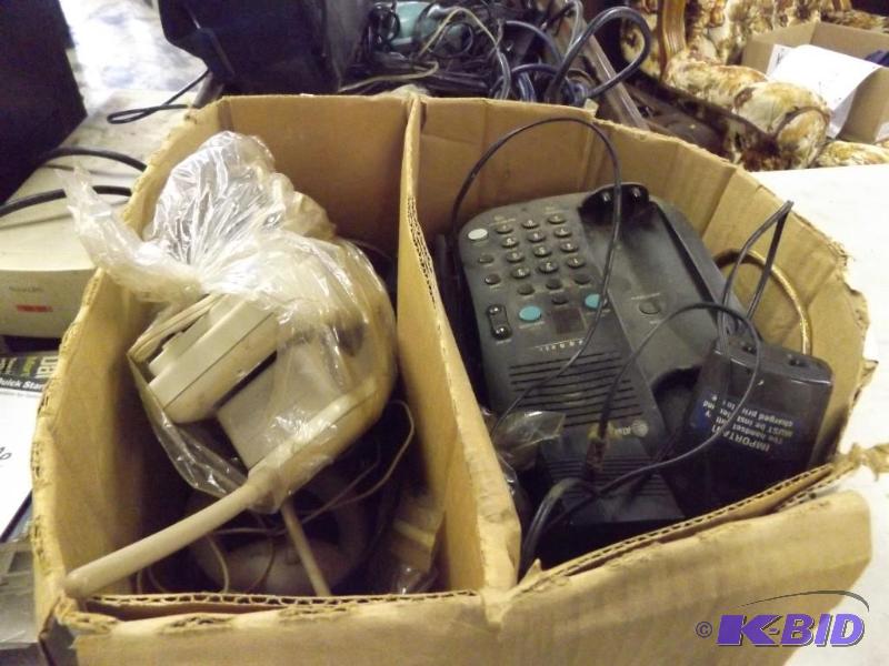 lot 568 image: box of misc phone items and cords, keyboard...