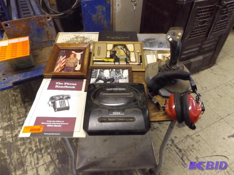 lot 577 image: Genesis Sega, untested, and joy stick. Ear pr...