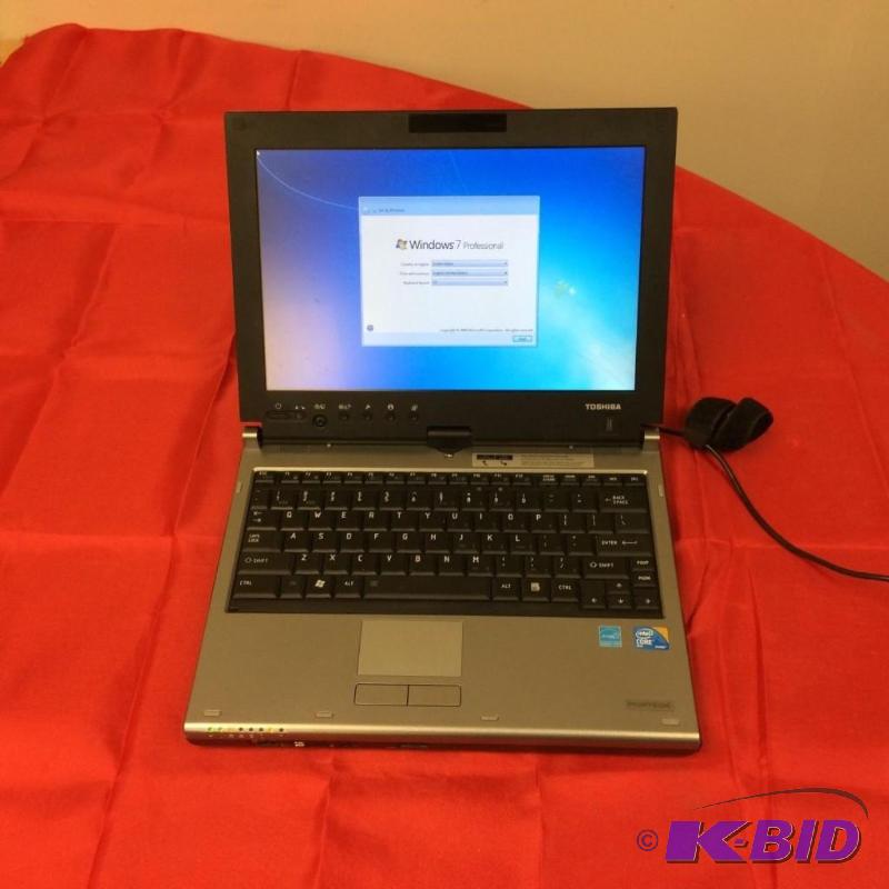 lot 1 image: Toshiba Portege M750 Personal Laptop Runs Wi...