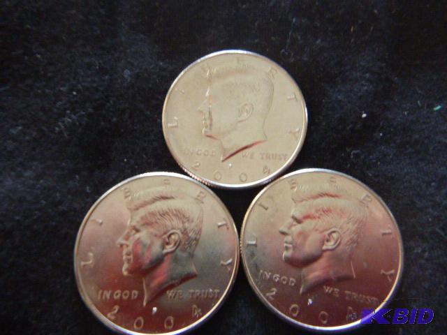 Three 2004 P Kennedy Half Dollars...