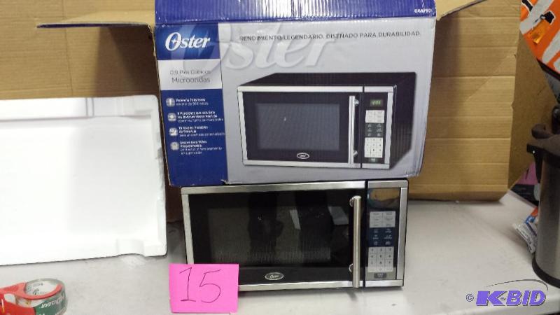 lot 15 image: Oster  Microwave Oven