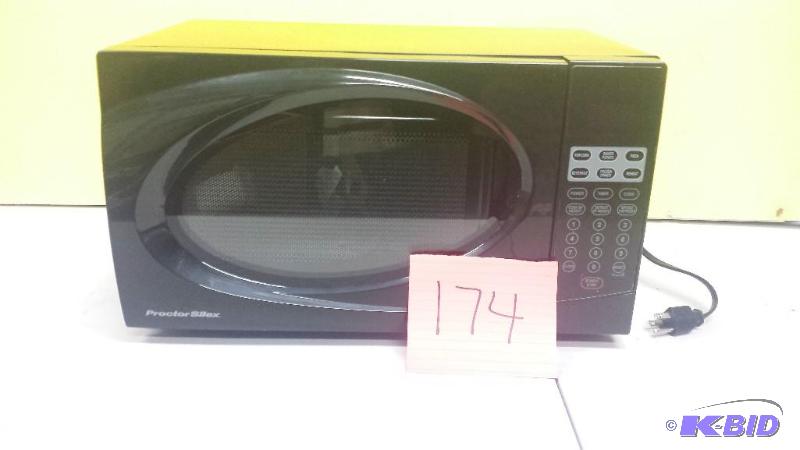 lot 174 image: Ptoctor Silex 0.7 CU Capacity 700 Watts 10 power levels 6 cooking settings