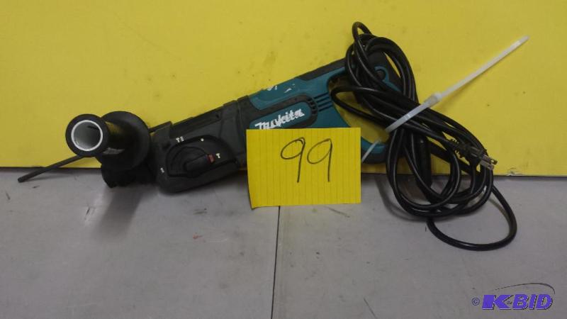 lot 99 image: Makita concrete hammer drill