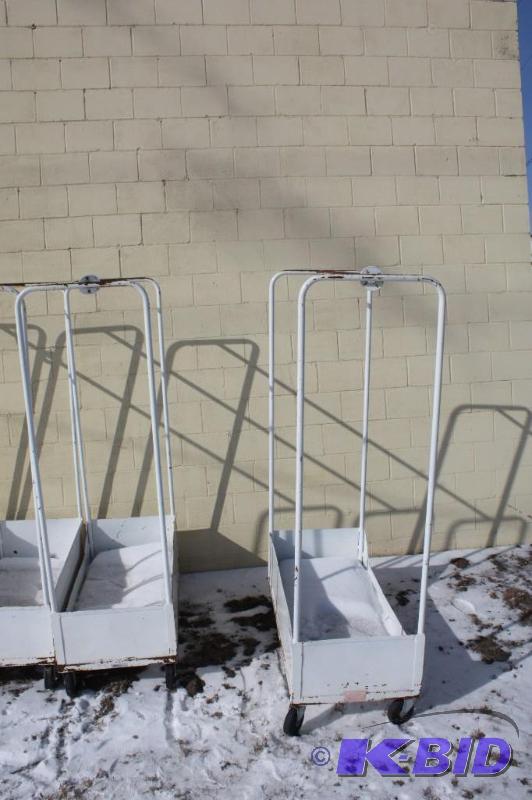 lot 307 image: Lot of (2) Metal Luggage Racks wCoat Hanger Top & Wheels 22 x 45.5 x 74 White.