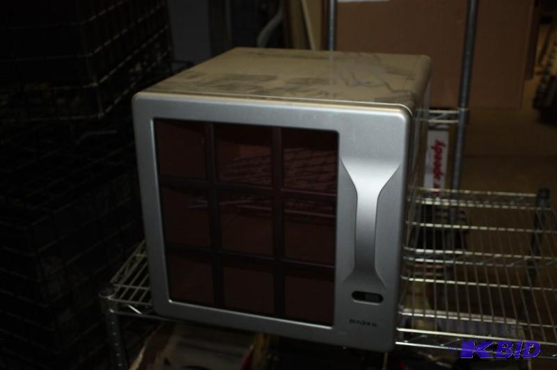 lot 410 image: Bonjour Wine Cube 11 Bottle Wine Refrigerator Model WC900 AC 120 V 60 HZ .88 Amp Silver.