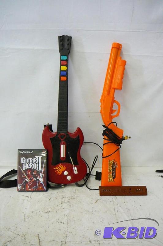 lot 54 image: Guitar Hero 11 & Back Hunter Pro...