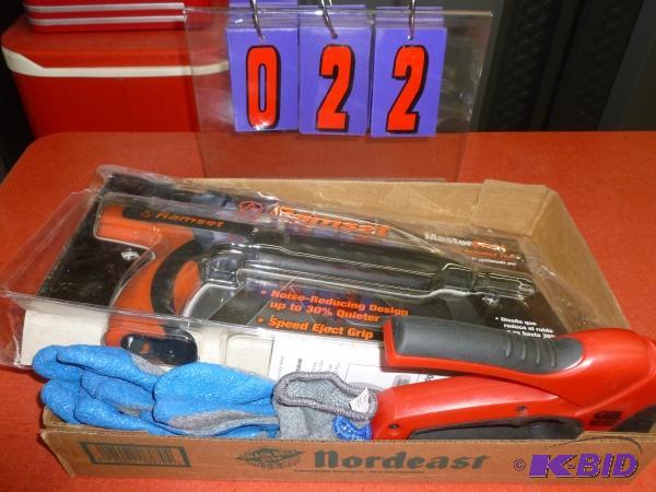 Ramset power tool with gloves and stapler. As...