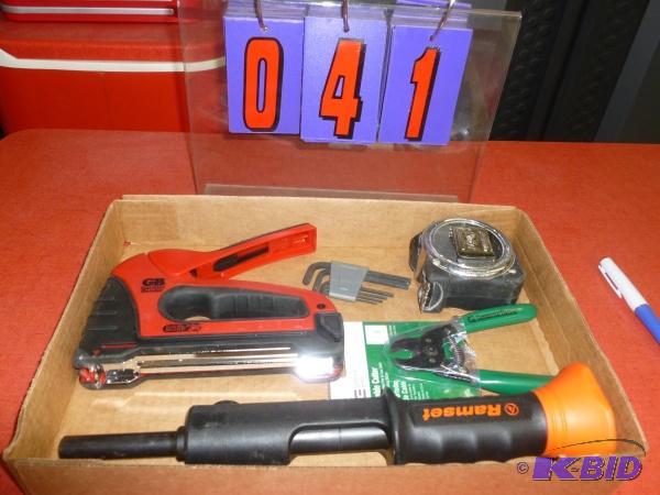 Flat of tools. As shown. with ramset power na...