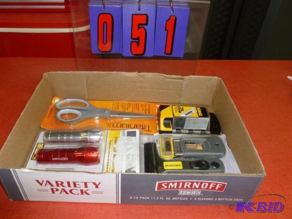 Flat of scissors, utility blades and flashlig...
