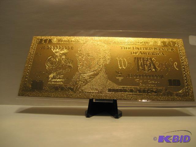 lot 30 image: 10 DOLLAR GOLD BILL, PURE 24K GOLD PRESSED ON TO A SPECIAL POLYCARBONATE TO MAKE THIS BILL