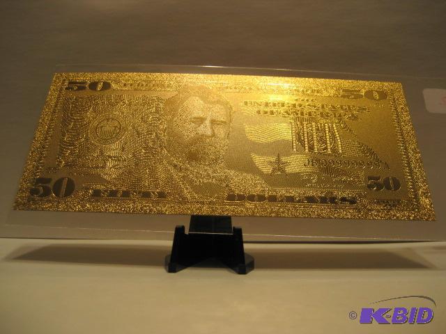 lot 32 image: 50 DOLLAR GOLD BILL, PURE 24K GOLD PRESSED ON TO A SPECIAL POLYCARBONATE TO MAKE THIS BILL