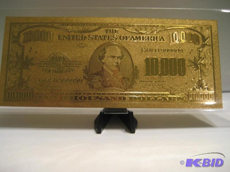 lot 37 image: 10,000 DOLLAR GOLD BILL, PURE 24K GOLD PRESSED ON TO A SPECIAL POLYCARBONATE TO MAKE THIS BILL THIS IS THE LAST OF THE LARGER DENOMINATION BILLS, NOT SURE IF THERE WILL BE NY MORE FOR SAL