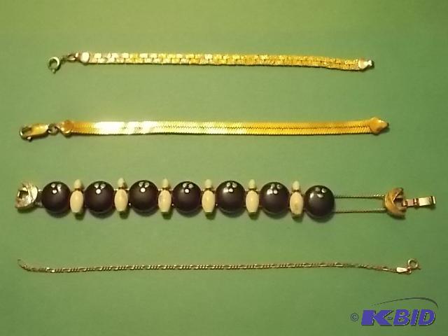 4 Assorted Goldtone Bracelets...