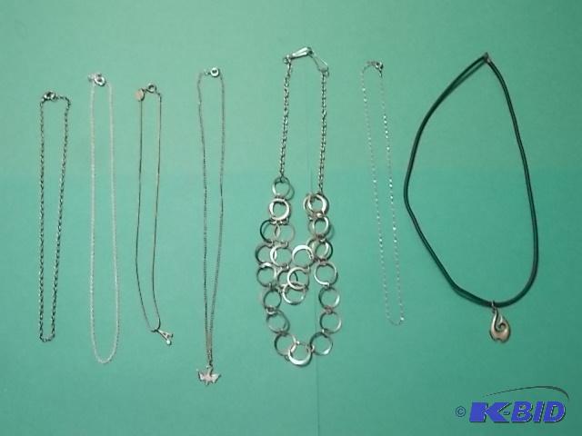 7- Silvertone Necklaces...