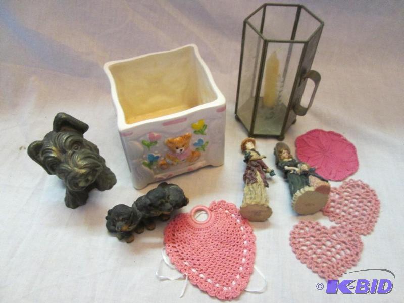 Assorted household dcor including needlework,...