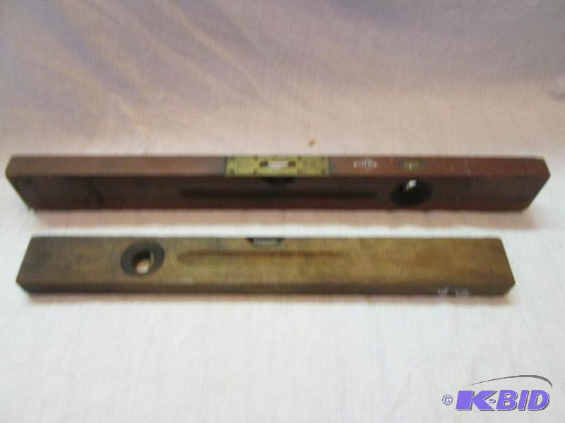 2 vintage level tools, made of wood...