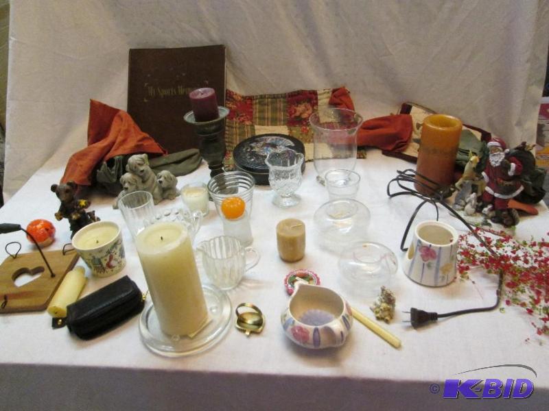mixed lot of candles, holders, cups and figur...