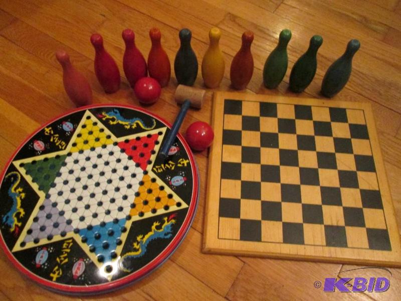 Chinese checker tin and regular checker board...