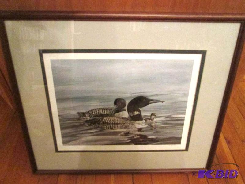 Framed and matted loon scene signed by A J Go...