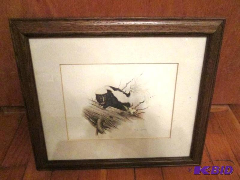 Framed and matted skunk print, 14 x 11...