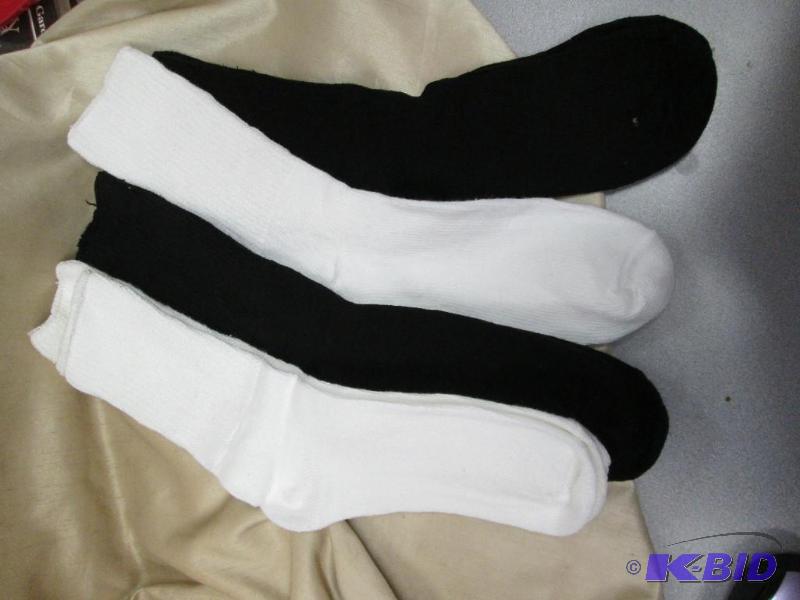 lot 149 image: 4 pairs of white and black socks...