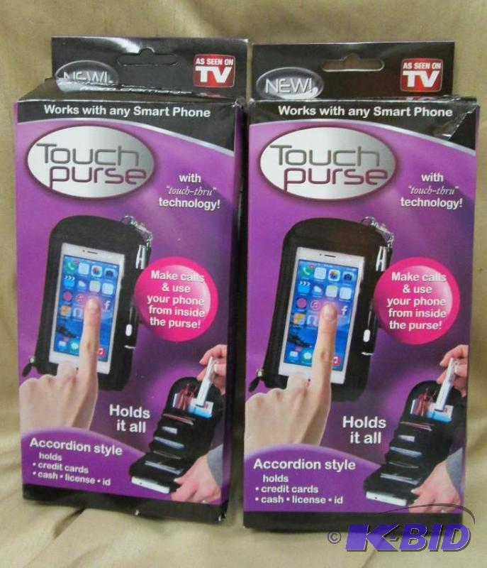 lot 158 image: Touch purse with touch-thru technology Make c...