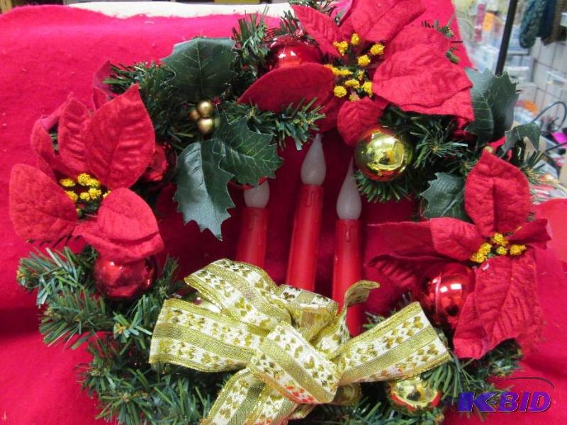 lot 174 image: Poinsettia wreath with illuminated candle acc...
