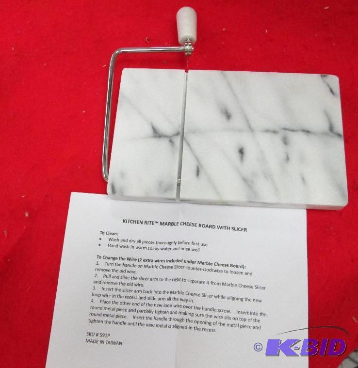 lot 2 image: Kitchen Rite Marble cheese board with slicer...
