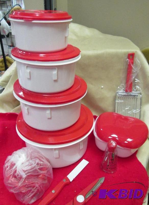 lot 21 image: 8 pc Microwave Cookware set with red lids and...
