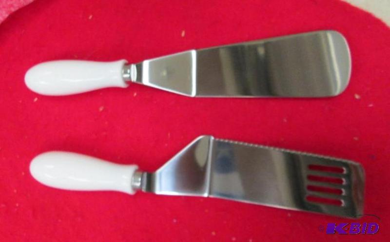 lot 32 image: 2pc Spatula set with white handles...