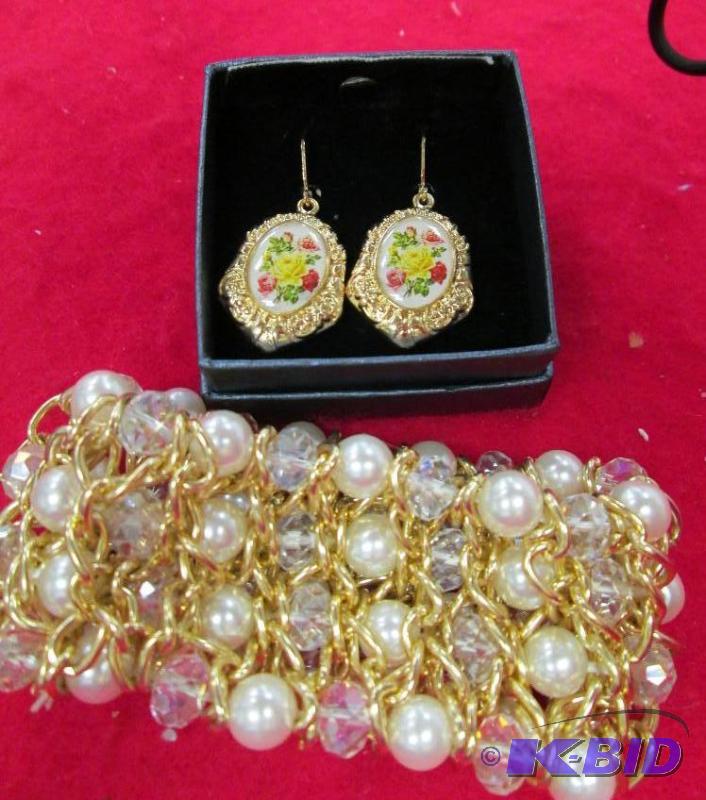lot 45 image: Earrings with flowers on and a bracelet...