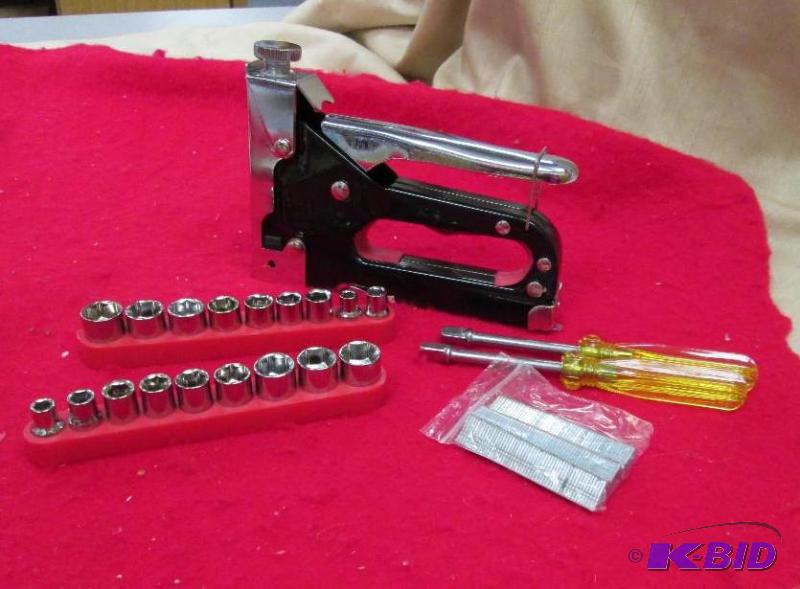 lot 53 image: 3 in1 staple gun and 2 10 pc socket sets...