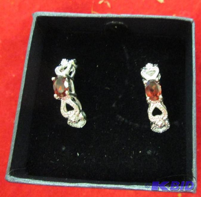 lot 56 image: pair of earrings have heart shapes design and...