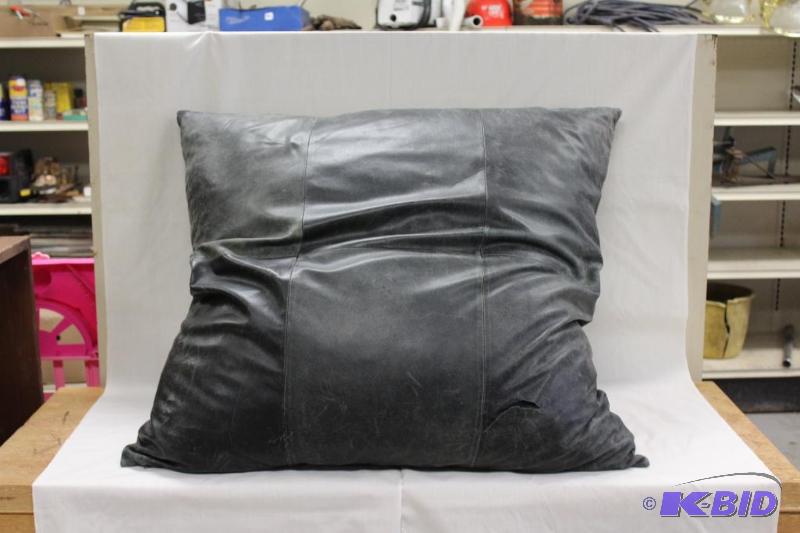 lot 55 image: Large Black Pillow, has a tear, would be a go...